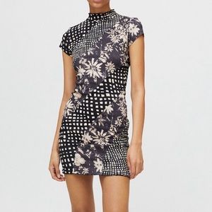 “Nina spliced bodycon mini dress”